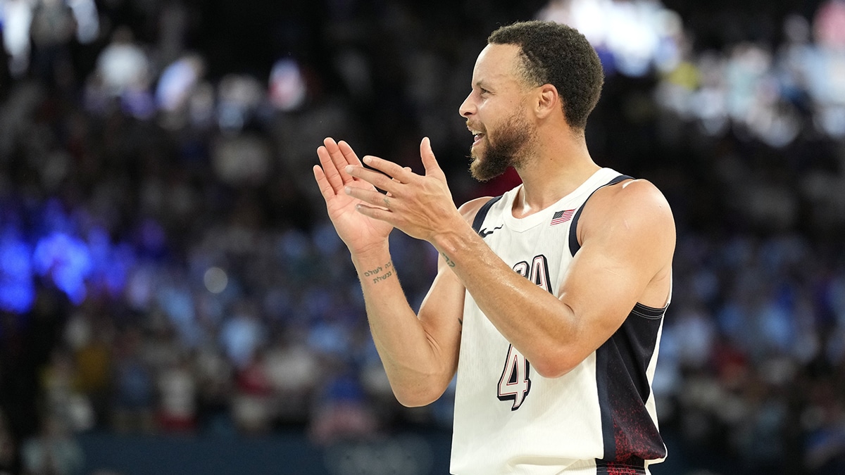 United States shooting guard Stephen Curry (4) celebrates after the game against Serbia in a men's basketball semifinal game during the Paris 2024 Olympic Summer Games at Accor Arena.