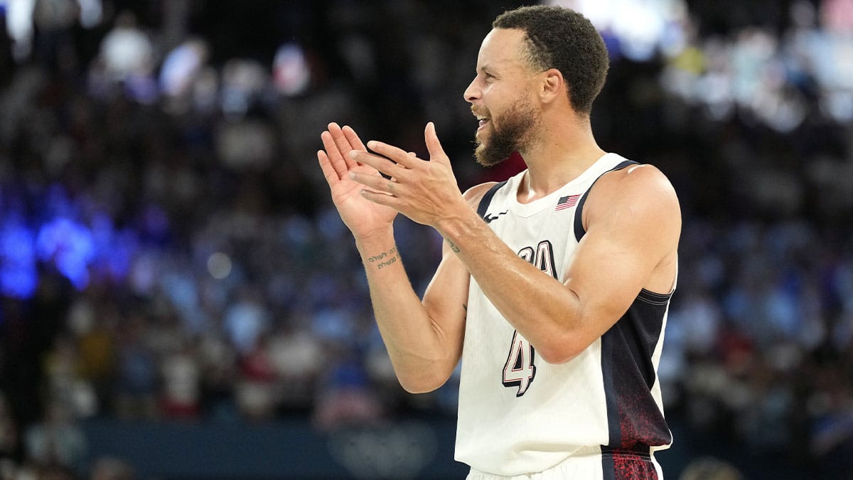 United States shooting guard Stephen Curry (4) celebrates after the game against Serbia in a men's basketball semifinal game during the Paris 2024 Olympic Summer Games at Accor Arena.