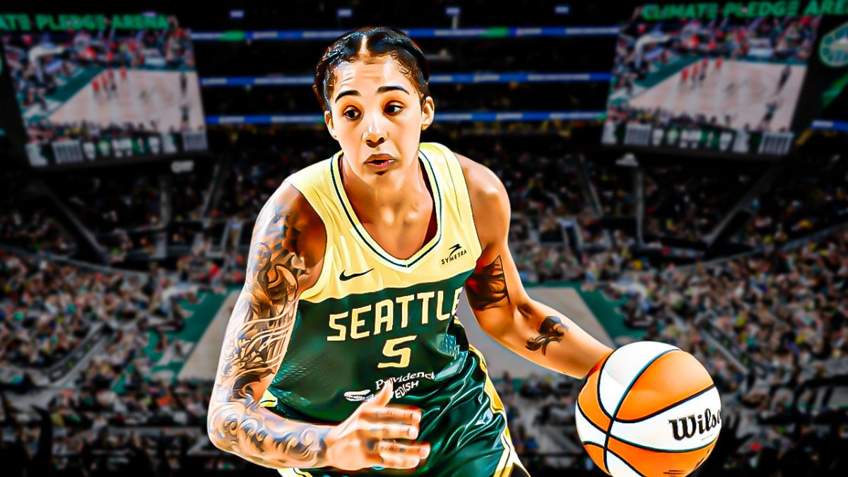 Seattle Storm player Gabby Williams with the Seattle Storm arena in the background, WNBA prioritization