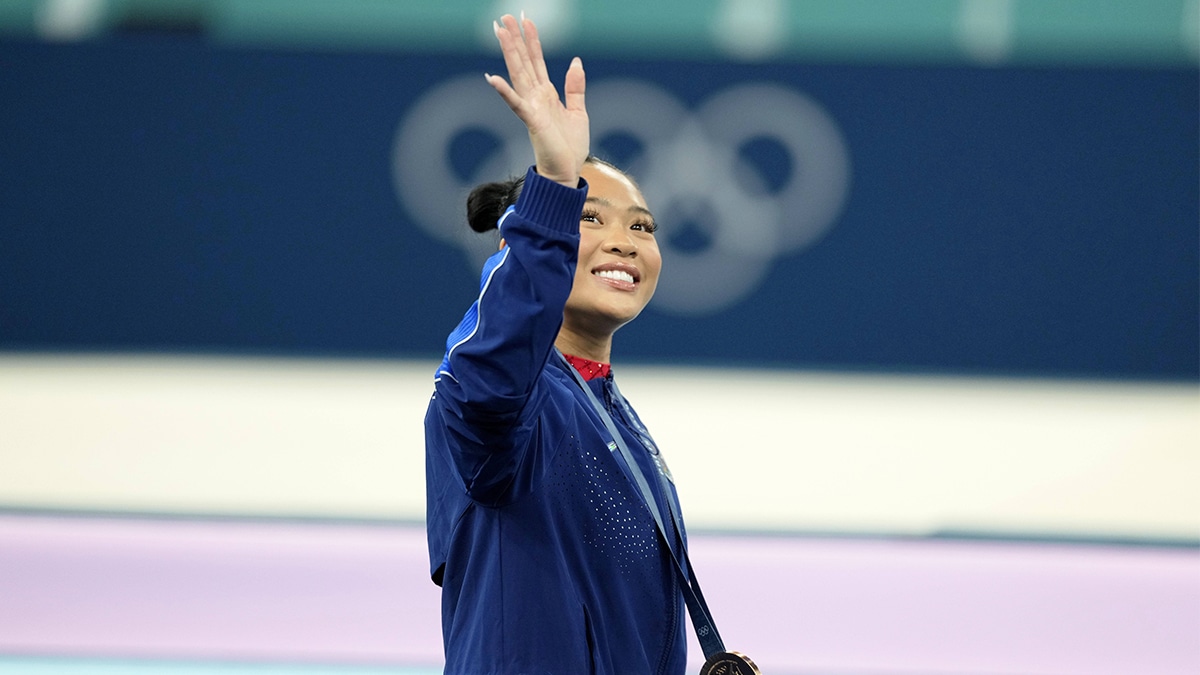 Sunisa Lee of the United States reacts after winning the bronze medal