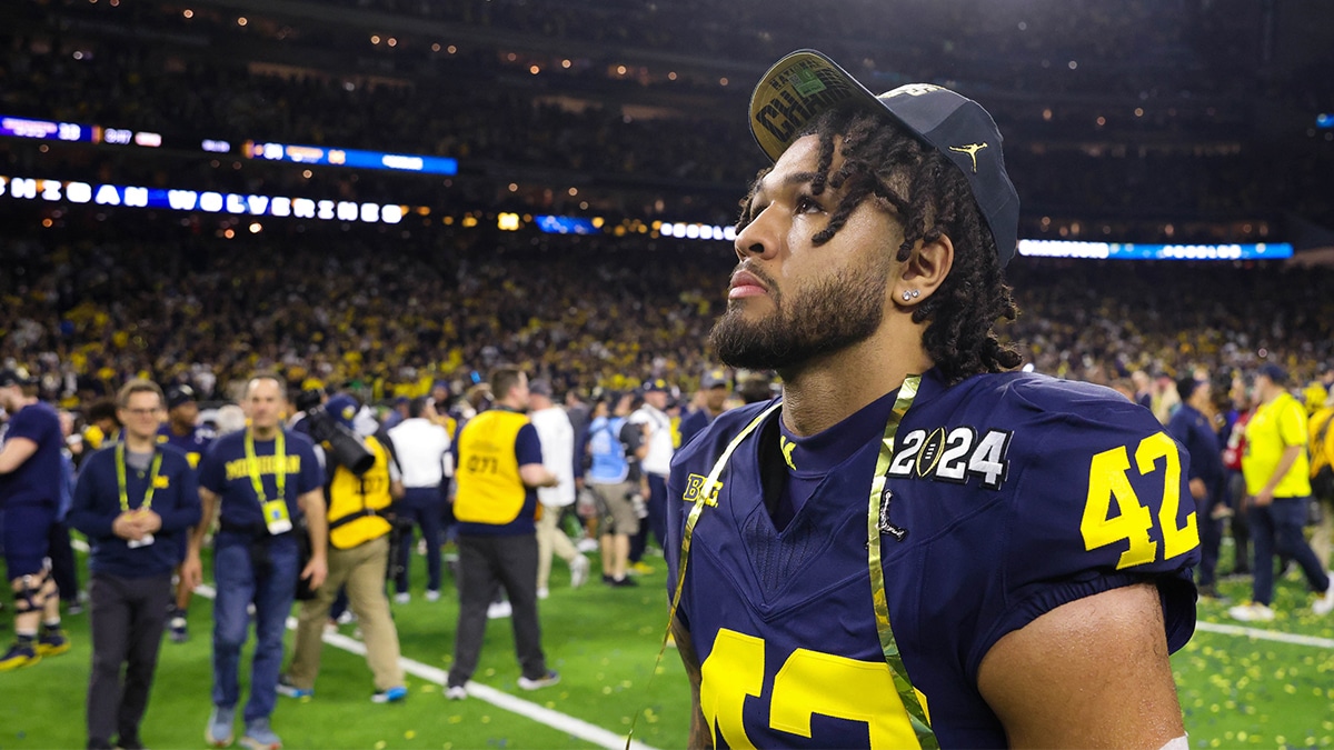 Michigan Wolverines defensive end TJ Guy (42) after the Wolverines defeated the Washington Huskies in the 2024 College Football Playoff national championship game at NRG Stadium. 