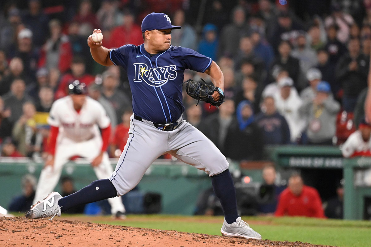 Tampa Bay Rays pitcher Erasmo Ramirez (61) pitches during the ninth inning against the Boston Red Sox at Fenway Park.