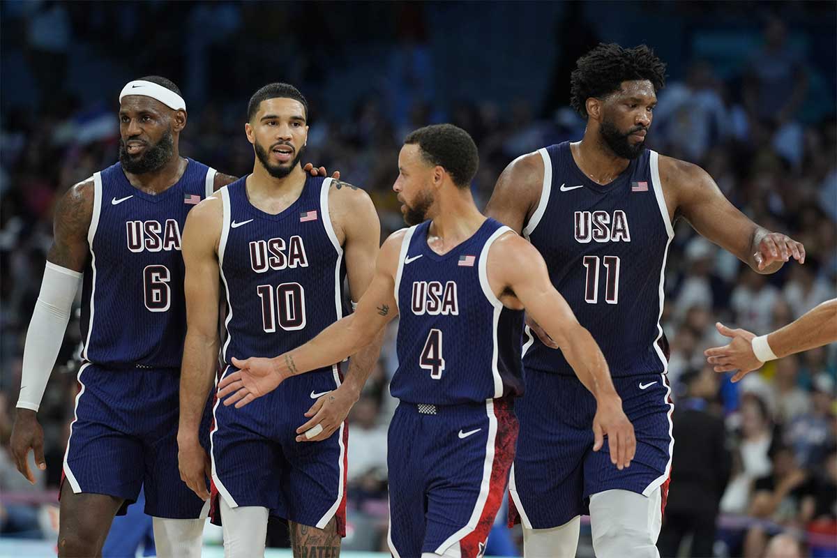 United States guard LeBron James (6), small forward Jayson Tatum (10), shooting guard Stephen Curry (4) and center Joel Embiid (11) in the second quarter against Puerto Rico during the Paris 2024 Olympics Summer Games at Stade Pierre-Mauroy.