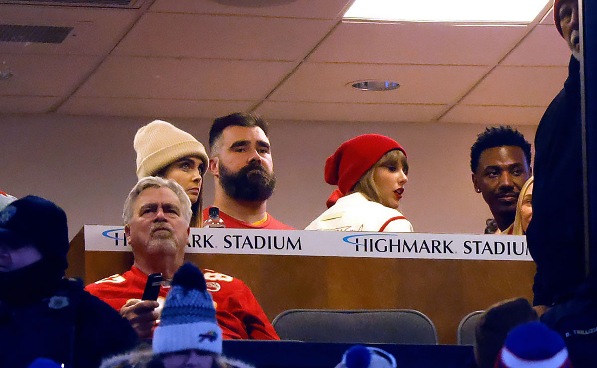 Taylor Swift and Jason Kelce watching Travis Kelce during Chiefs game against the Buffalo Bills.