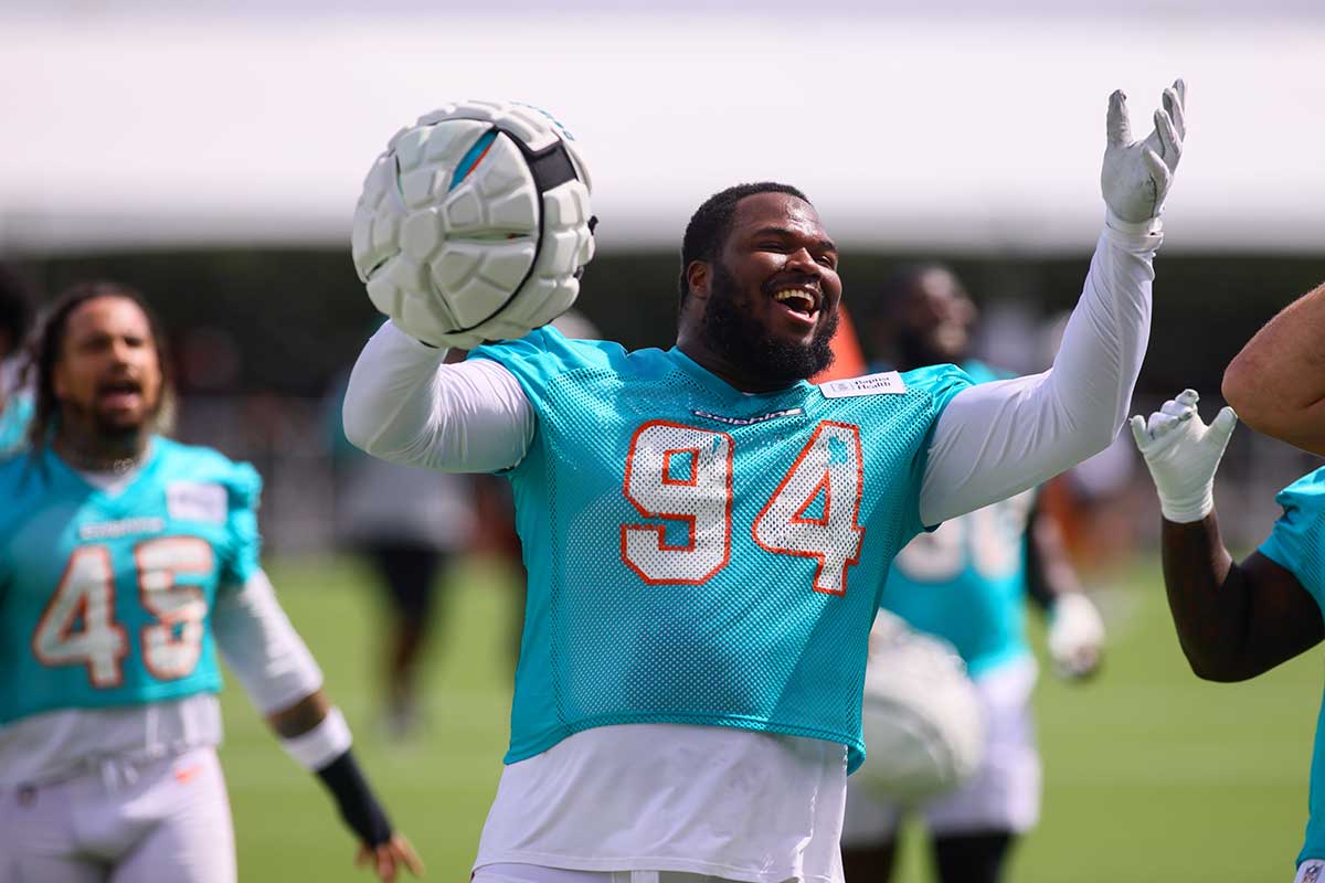 Miami Dolphins defensive tackle Teair Tart (94) reacts toward the fans during training camp at Baptist Health Training Complex.