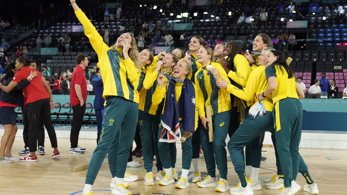 Team Australia celebrates after receiving the bronze medal for women’s basketball during the Paris 2024 Olympic Summer Games at Accor Arena.