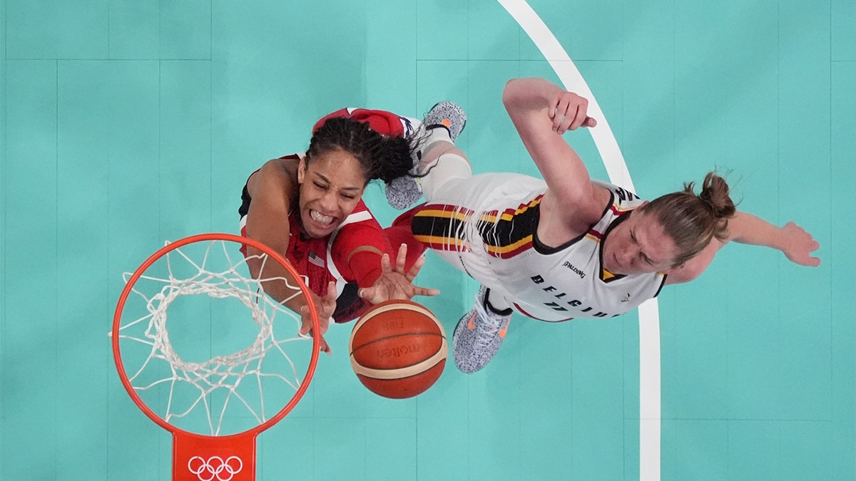 United States forward A'Ja Wilson (9) shoots against Belgium power forward Emma Meesseman (11) in the first half in a women’s group stage game during the Paris 2024 Olympic Summer Games at Stade Pierre-Mauroy.