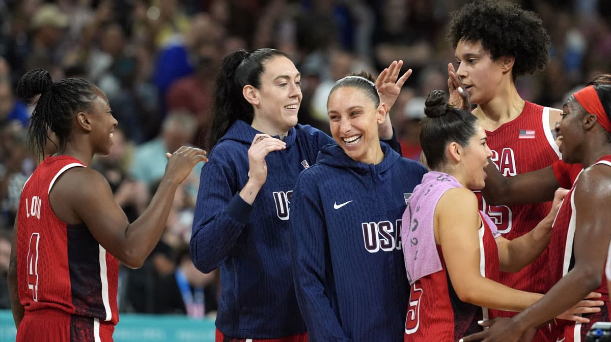 Aug 4, 2024; Villeneuve-d'Ascq, France; Team United States celebrates after defeating Germany in a women’s group C game during the Paris 2024 Olympic Summer Games at Stade Pierre-Mauroy.