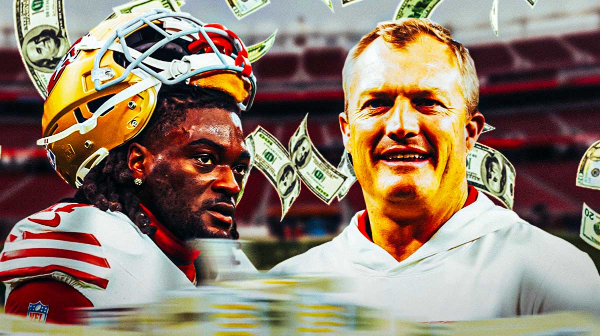 Brandon Aiyuk and John Lynch with a bunch of money falling in the background