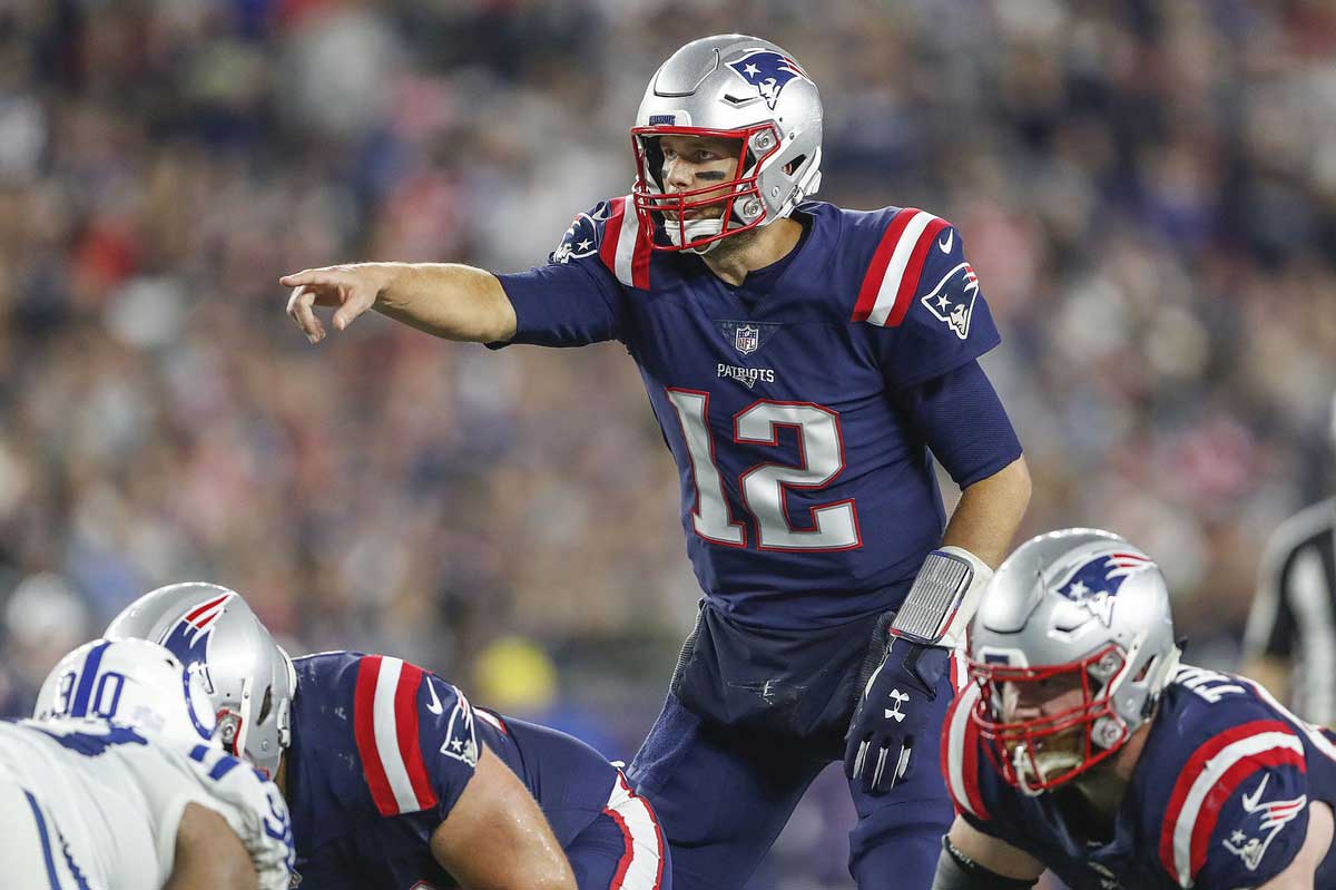 New England Patriots quarterback Tom Brady (12) calls an offensive play in the second quarter at Gillette Stadium.