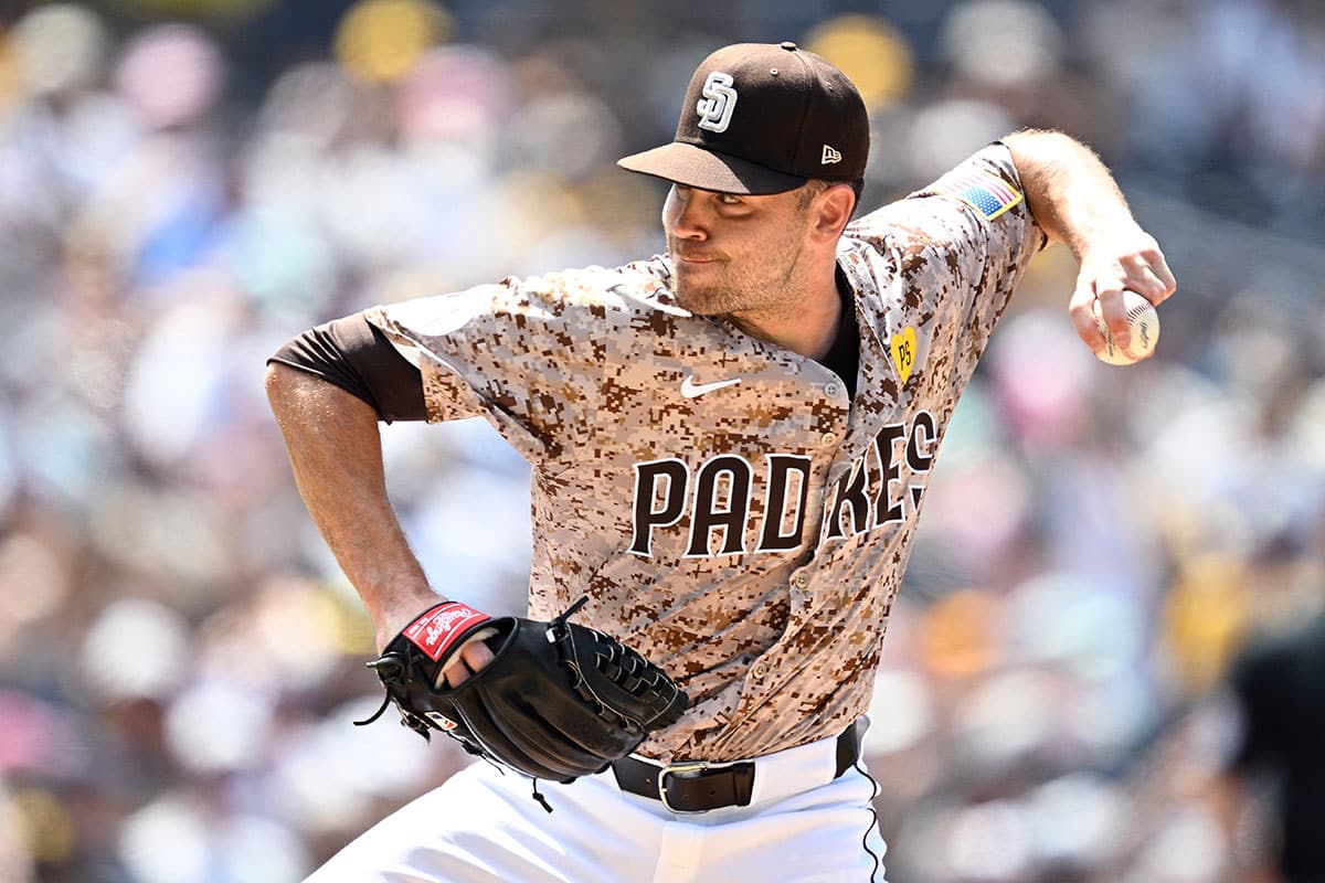 San Diego Padres relief pitcher Tom Cosgrove (59) pitches against the Milwaukee Brewers during the seventh inning at Petco Park.