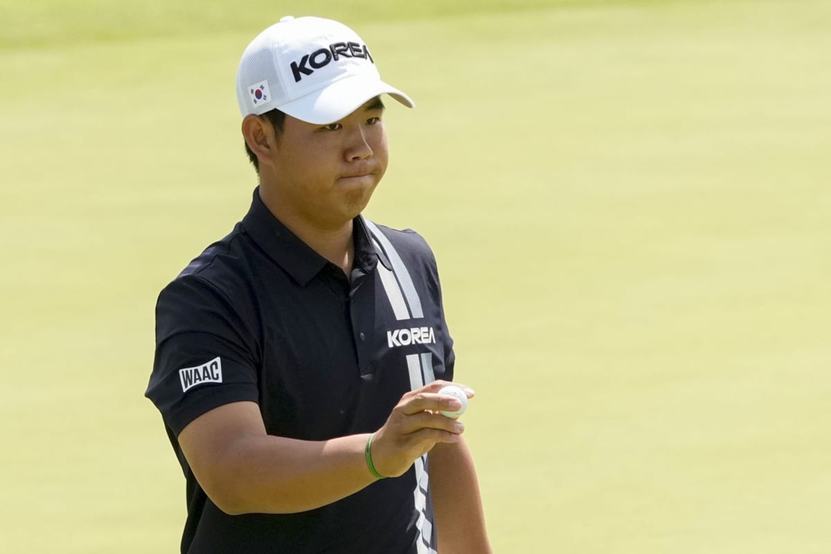 Tom Kim on no. 6 green during the Paris 2024 Olympic Summer Games at Le Golf National