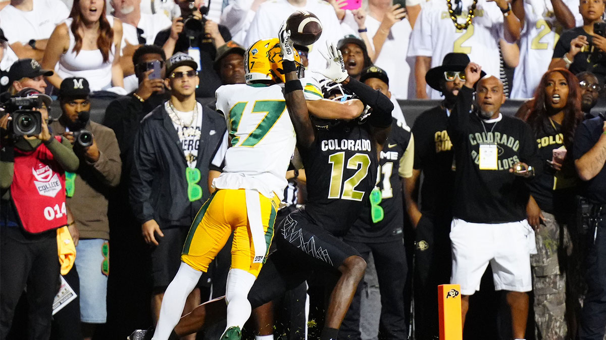 Colorado Buffaloes wide receiver Travis Hunter (12) pulls in a touchdown reception past North Dakota State Bison cornerback Jailen Duffie (17) in the second half at Folsom Field.