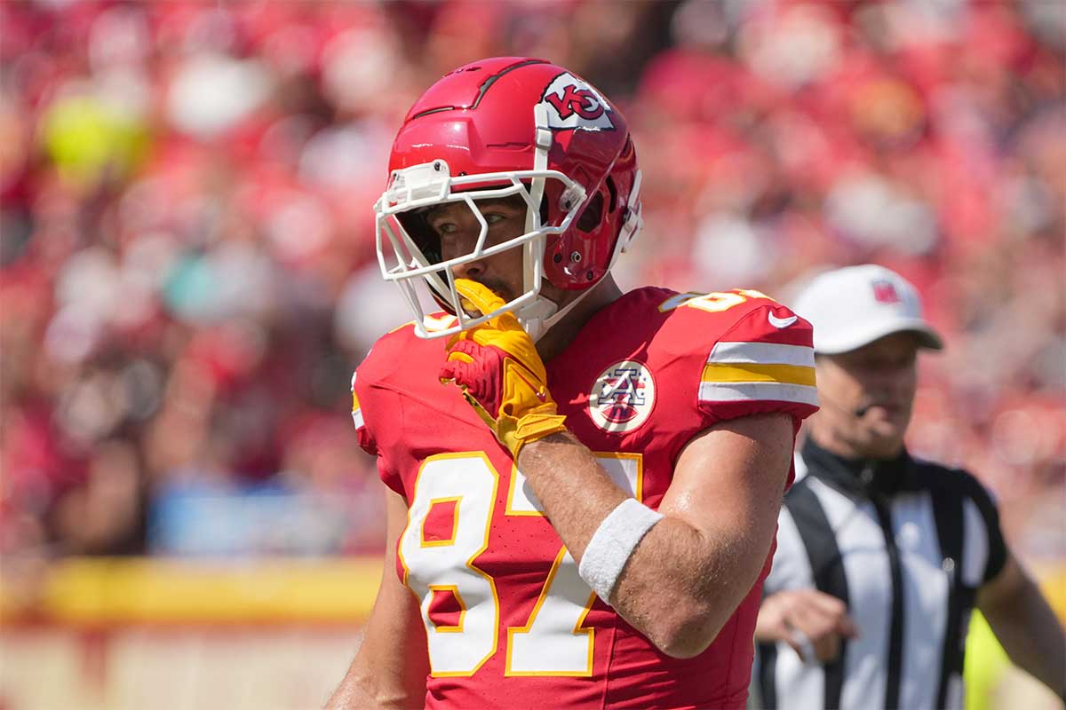 Kansas City Chiefs tight end Travis Kelce (87) celebrates after a play against the Detroit Lions during the first half at GEHA Field at Arrowhead Stadium.