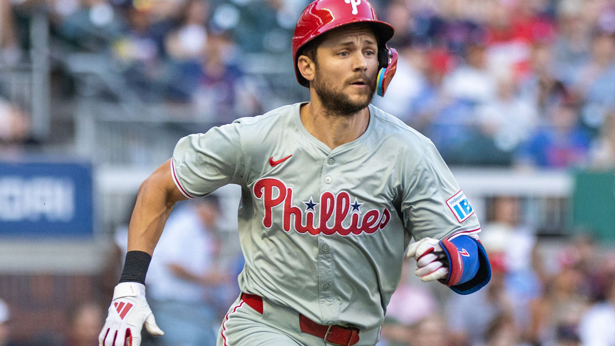 Philadelphia Phillies shortstop Trea Turner (7) runs to first base before getting thrown out at first base against the Atlanta Braves during the first inning at Truist Park.