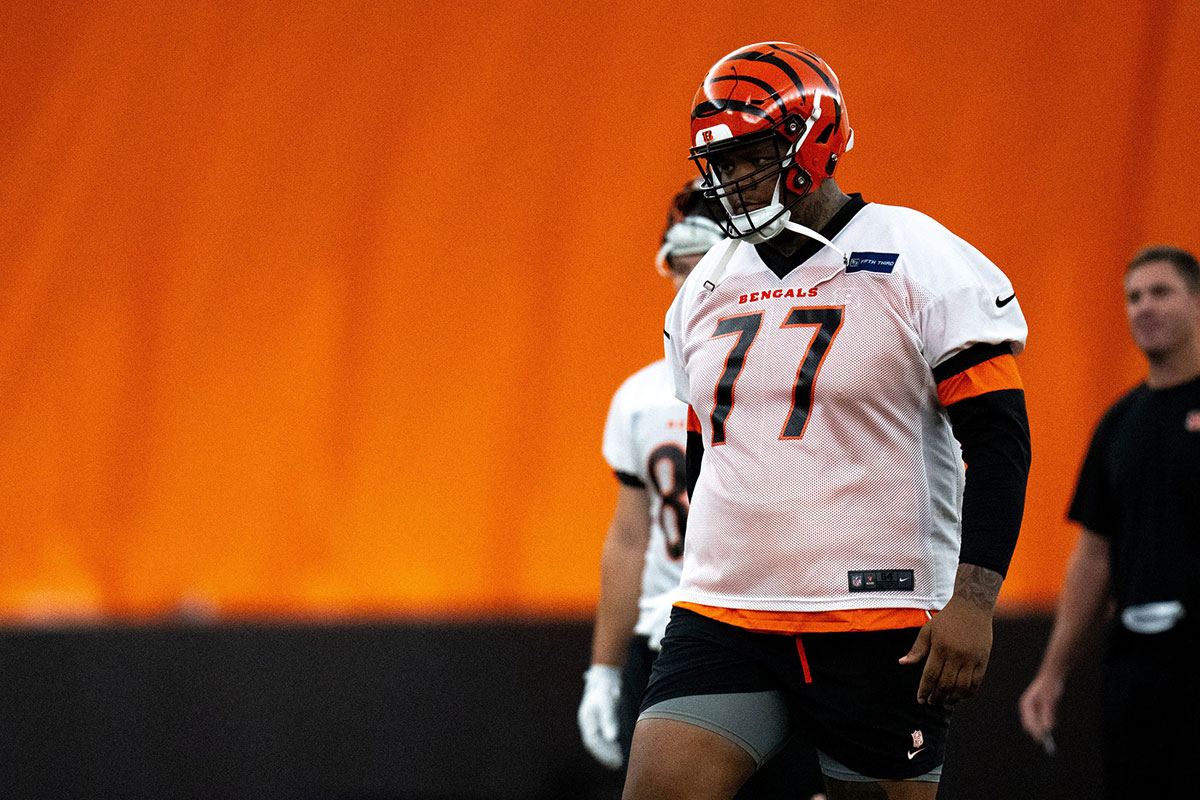 Cincinnati Bengals offensive tackle Trent Brown (77) walks to the line for field goal practice at Bengals spring practice at the IEL Indoor Facility in Cincinnati on Wednesday, June 12, 2024.