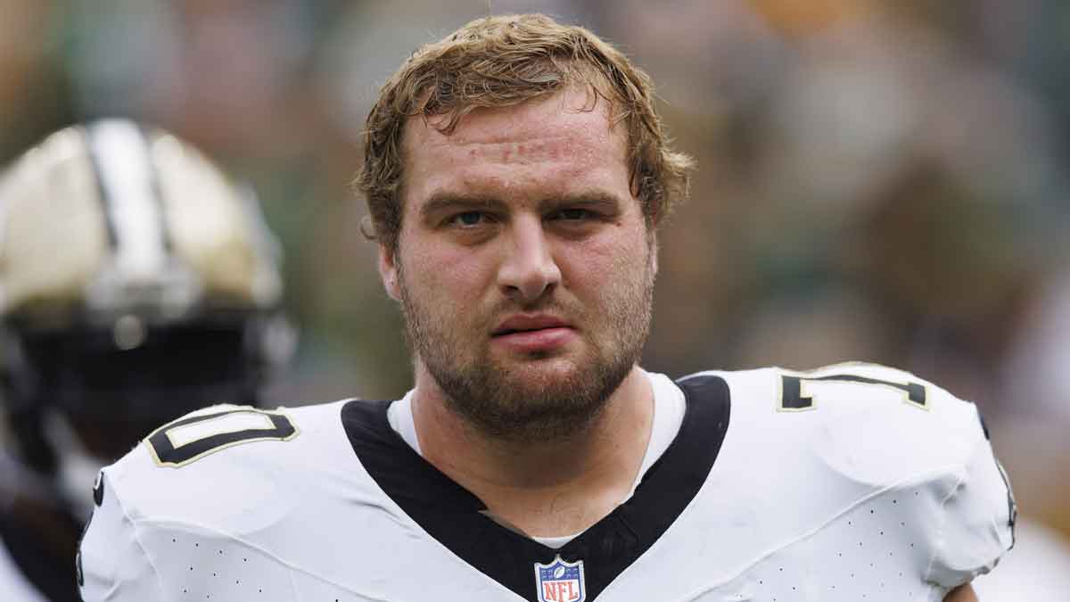 New Orleans Saints offensive tackle Trevor Penning (70) during warmups prior to the game against the Green Bay Packers at Lambeau Field.