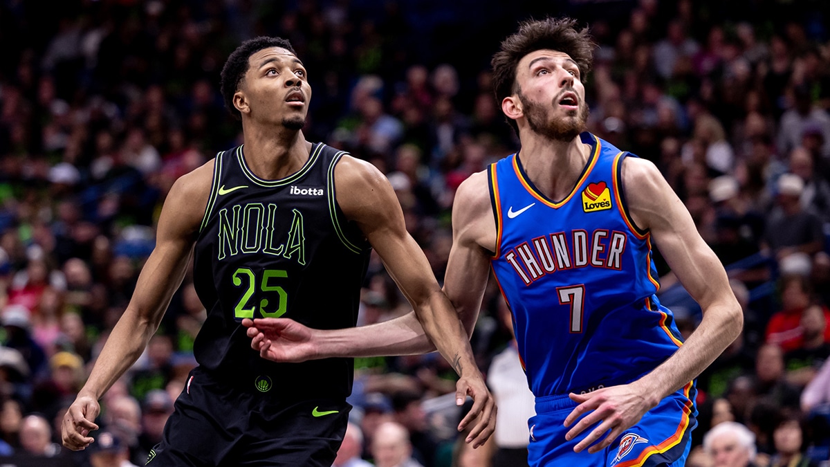 New Orleans Pelicans guard Trey Murphy III (25) and Oklahoma City Thunder forward Chet Holmgren (7) go for rebounds during game four of the first round for the 2024 NBA playoffs at Smoothie King Center. 