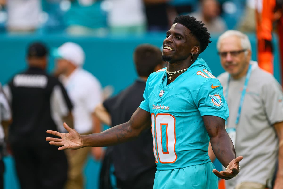 Miami Dolphins wide receiver Tyreek Hill (10) reacts as he walks on the field before the game against the Atlanta Falcons at Hard Rock Stadium. 