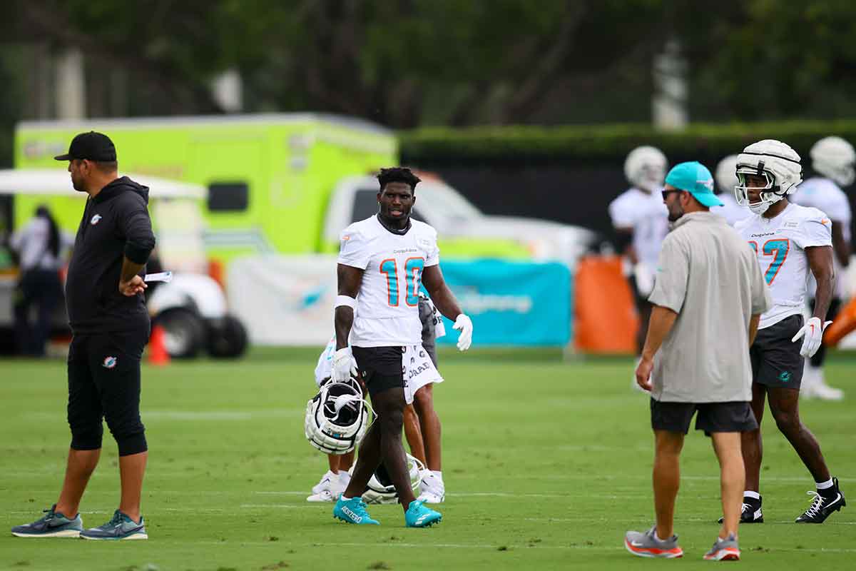 Miami Dolphins wide receiver Tyreek Hill (10) looks on during training camp at Baptist Health Training Complex