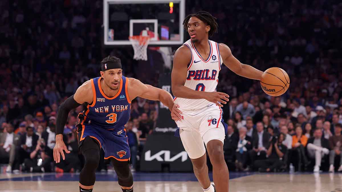 Philadelphia 76ers guard Tyrese Maxey (0) controls the ball against New York Knicks guard Josh Hart (3) during the first quarter of game 5 of the first round of the 2024 NBA playoffs at Madison Square Garden. 