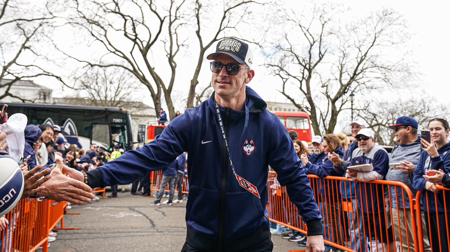 UConn Huskies head coach Dan Hurley is greeted by fans as he and his team arrive at the State Capitol before teams NCAA Mens Basketball Championship victory parade.