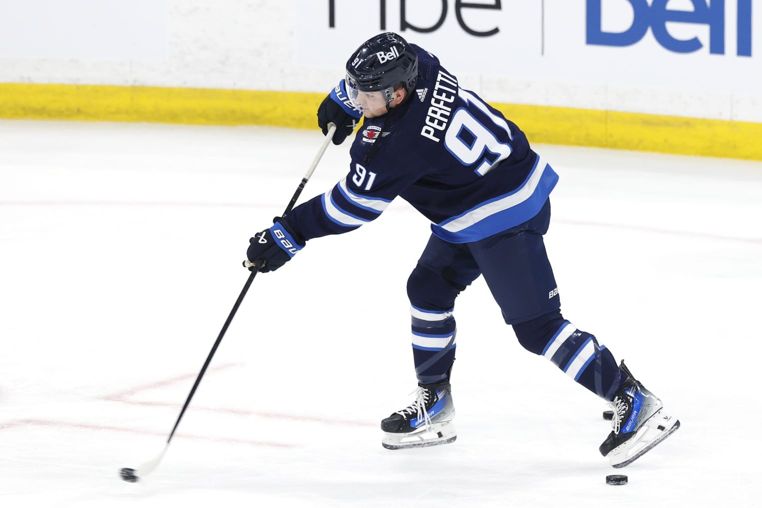 Winnipeg Jets center Cole Perfetti (91) warms up before the game against the Colorado Avalanche in game five of the first round of the 2024 Stanley Cup Playoffs at Canada Life Centre.