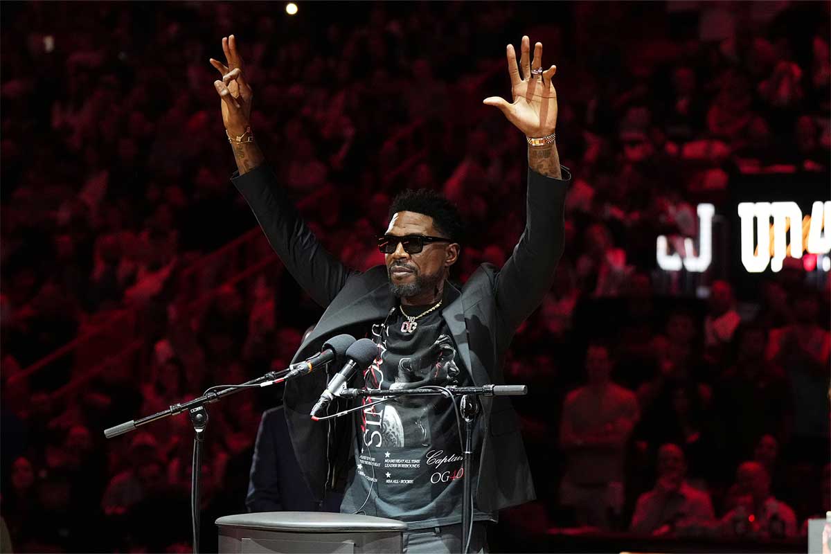 Udonis Haslem speaks after his jersey was lifted to the rafters during the retirement ceremony during halftime of the game between the Miami Heat and the Atlanta Hawks Kaseya Center.