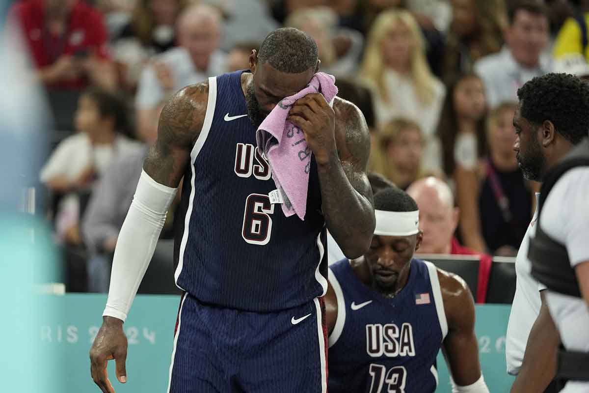 Aug 6, 2024; Paris, France; United States guard LeBron James (6) reacts after a play against Brazil in the third quarter in a men’s basketball quarterfinal game during the Paris 2024 Olympic Summer Games at Accor Arena. Mandatory Credit: Kyle Terada-USA TODAY Sports