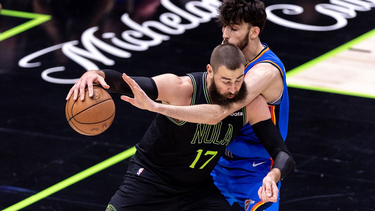 Apr 29, 2024; New Orleans, Louisiana, USA; New Orleans Pelicans center Jonas Valanciunas (17) drives into Oklahoma City Thunder forward Chet Holmgren (7) during game four of the first round for the 2024 NBA playoffs at Smoothie King Center.