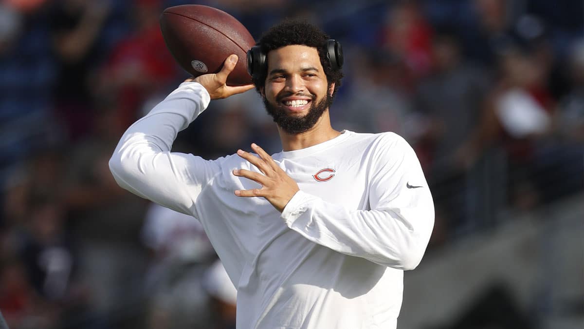 Chicago Bears quarterback Caleb Williams (18) warms up before the game against the Houston Texans at Tom Benson Hall of Fame Stadium.