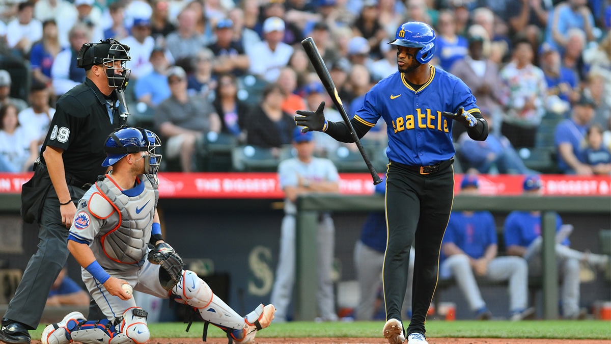 Seattle Mariners center fielder Victor Robles (10) reacts to walking with the bases loaded against the New York Mets during the seventh inning at T-Mobile Park.