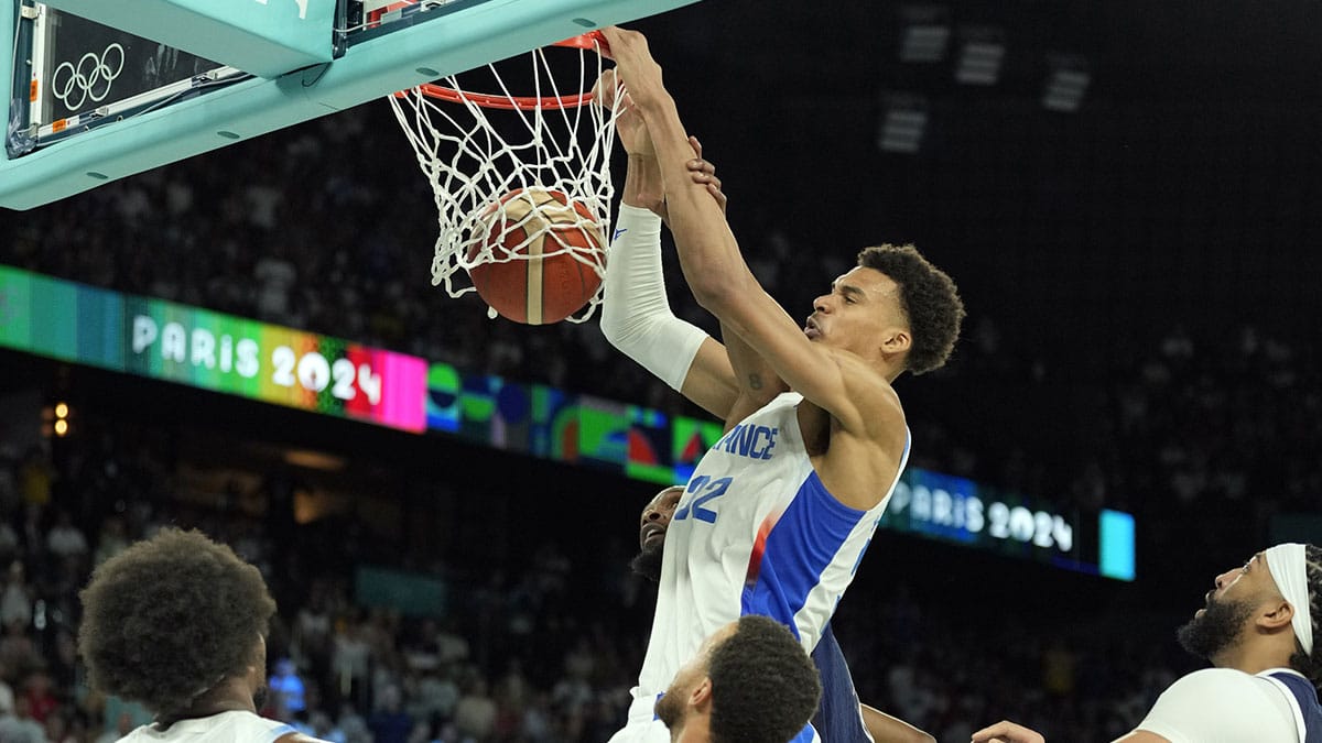 France power forward Victor Wembanyama (32) shoots against the United States in the second half in the men's basketball gold medal game during the Paris 2024 Olympic Summer Games at Accor Arena.