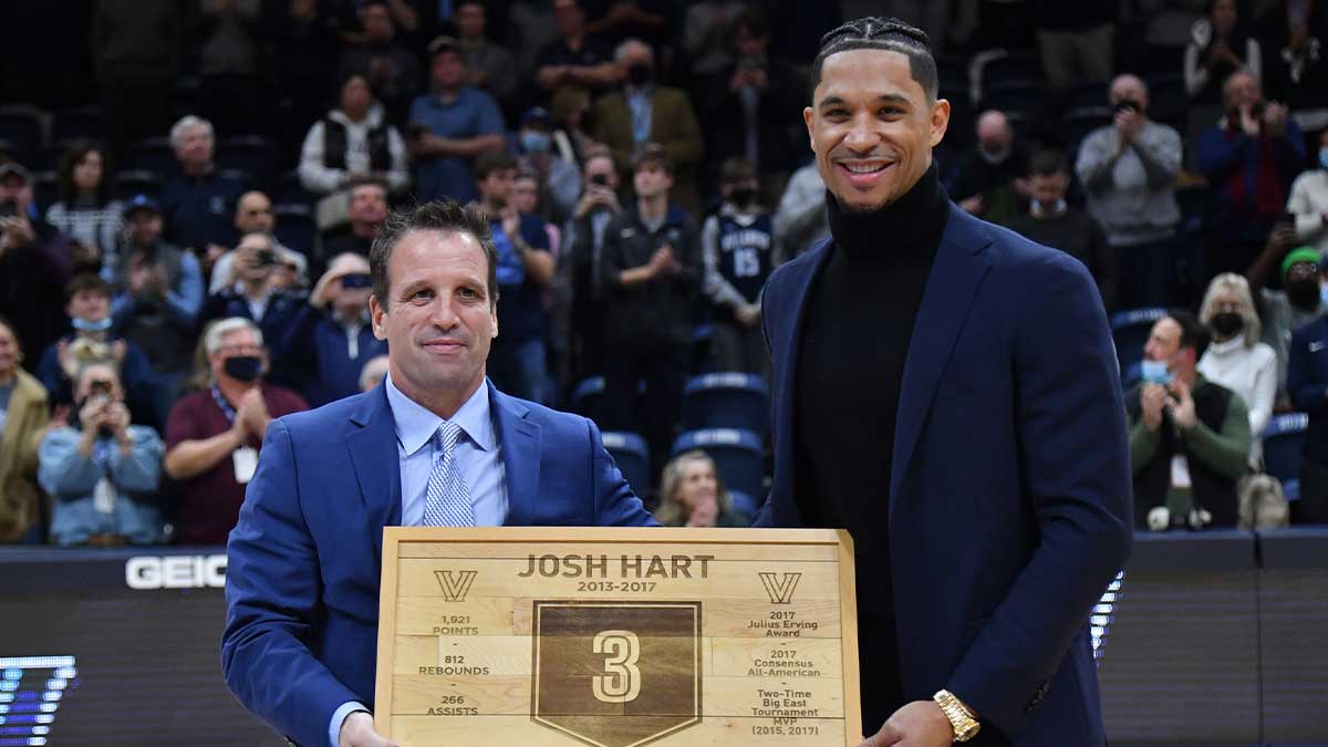 Former Villanova Wildcats player Josh Hart with Athletic Director Mark Jackson after having his number retired during ceremony at halftime against the Marquette Golden Eagles at William B. Finneran Pavilion.