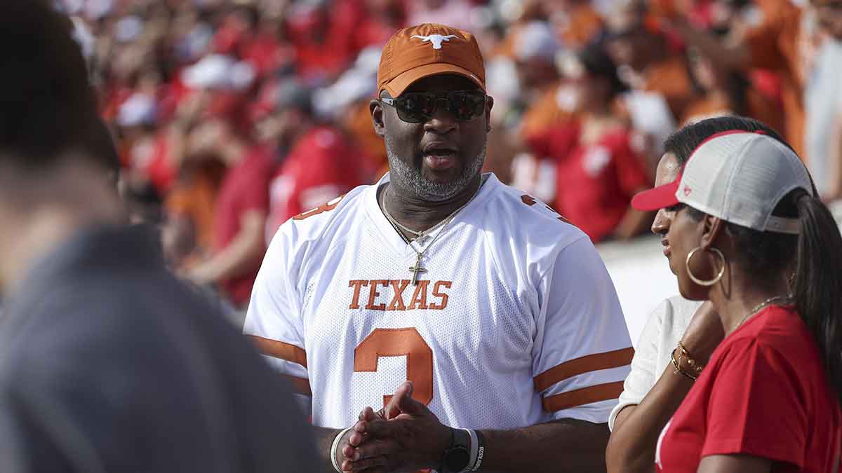 Former Texas Longhorns player Vince Young on the sideline during the game against the Houston Cougars at TDECU Stadium.