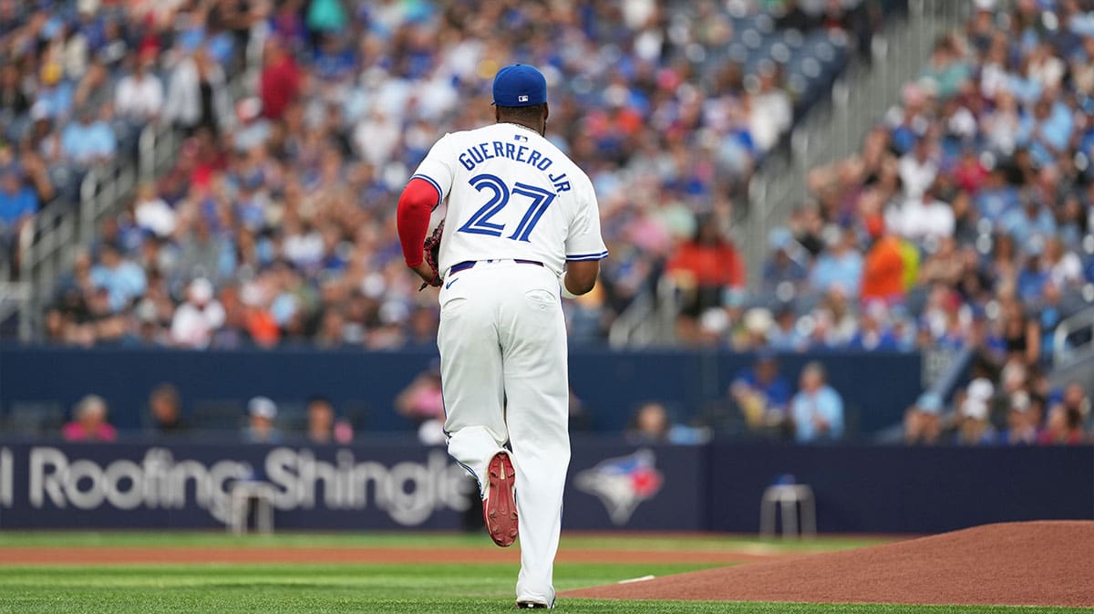 Toronto Blue Jays first baseman Vladimir Guerrero Jr. (27) runs out of the dugout prior to the start of a game against the Baltimore Orioles at Rogers Centre. 