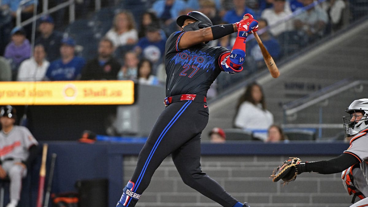 Toronto Blue Jays first base Vladimir Guerrero Jr. (27) hits a RBI double in the second inning against the Baltimore Orioles at Rogers Centre. 