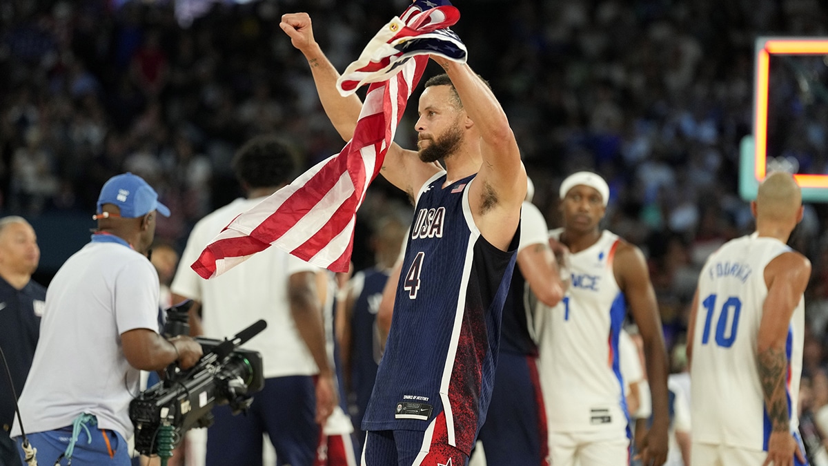 United States shooting guard Stephen Curry (4) celebrates after defeating France in the men's basketball gold medal game during the Paris 2024 Olympic Summer Games at Accor Arena