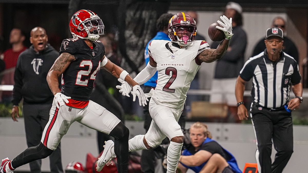 Washington Commanders wide receiver Dyami Brown (2) tries to make a one handed catch behind Atlanta Falcons cornerback A.J. Terrell (24) during the first quarter at Mercedes-Benz Stadium. 
