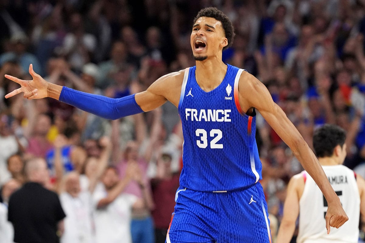 France power forward Victor Wembanyama (32) celebrates after defeating Japan in men’s basketball group B play during the Paris 2024 Olympic Summer Games at Stade Pierre-Mauroy.