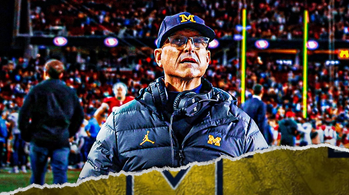 Michigan football, Wolverines, Jim Harbaugh, Jim Harbaugh Michigan, Jim Harbaugh honorary captain, Jim Harbaugh in Michigan gear with Michigan football stadium in the background