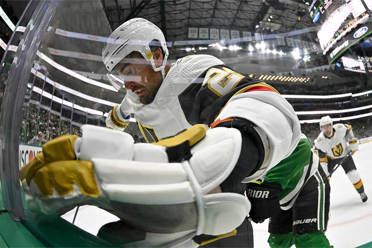 Vegas Golden Knights left wing William Carrier (28) battles for control of the puck in the Dallas Stars zone during the first period in game one of the first round of the 2024 Stanley Cup Playoffs at the American Airlines Center.