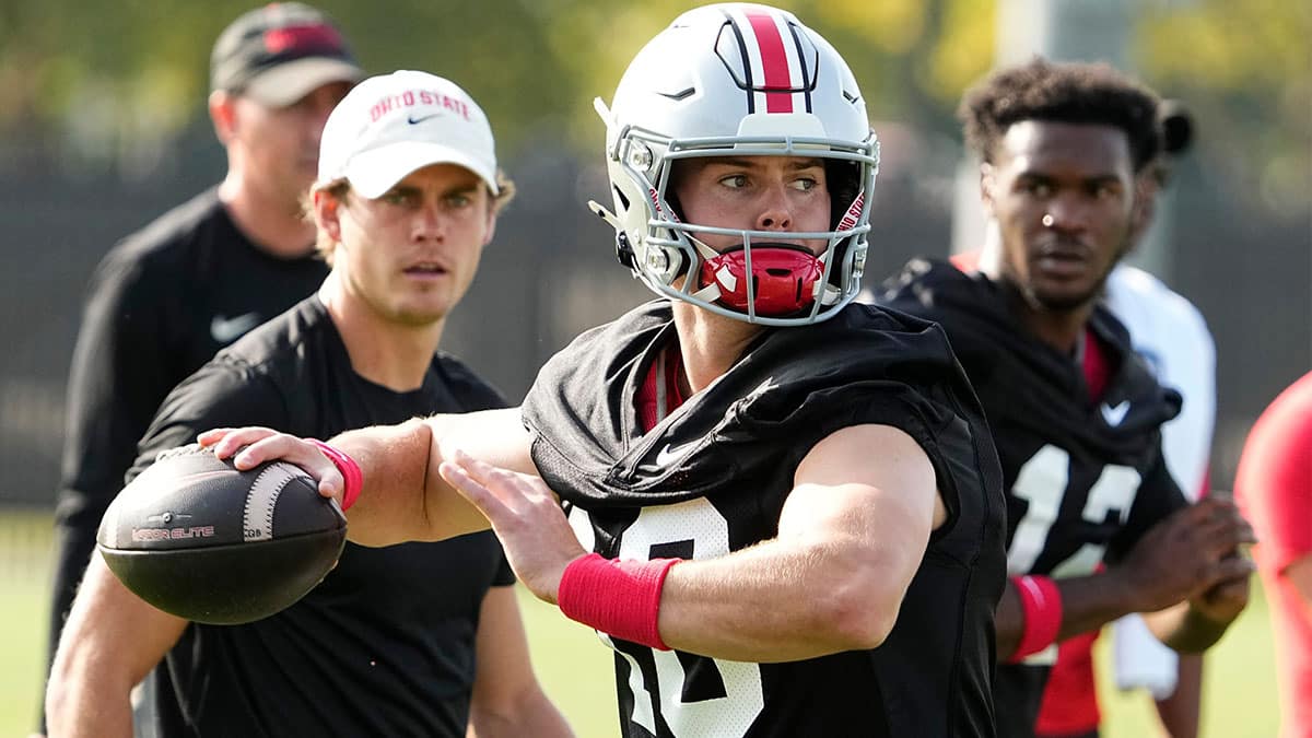 Ohio State Buckeyes quarterback Will Howard (18) throws during football camp at the Woody Hayes Athletic Complex.