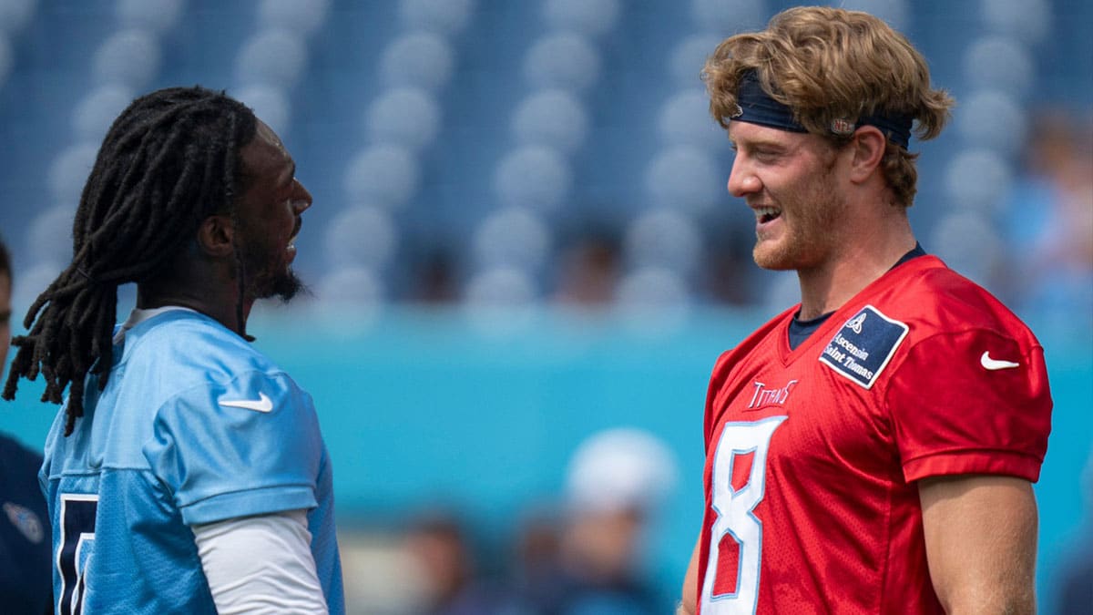 Tennessee Titans receiver Calvin Ridley (0) and quarterback Will Levis (8) greet each other before drills at Nissan Stadium in Nashville, Tenn., Saturday, July 27, 2024. The Titans hosted Back Together Weekend to allow fans to get a look at the retooled team.