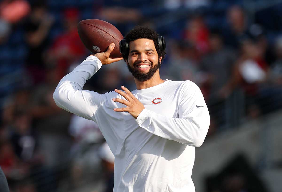 Chicago Bears quarterback Caleb Williams (18) warms up before the game against the Houston Texans at Tom Benson Hall of Fame Stadium. 