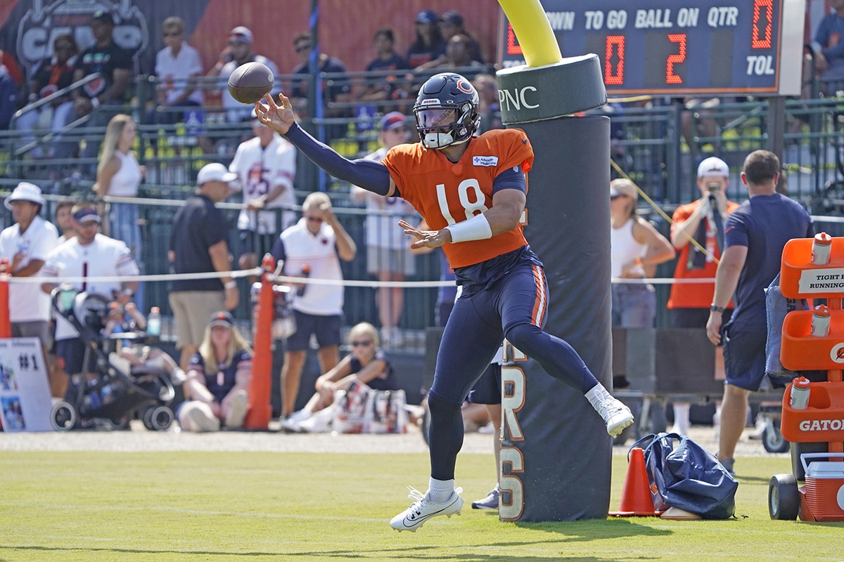 ; Chicago Bears quarterback Caleb Williams (18) throws a pass during Chicago Bears Training Camp at Halas Hall.