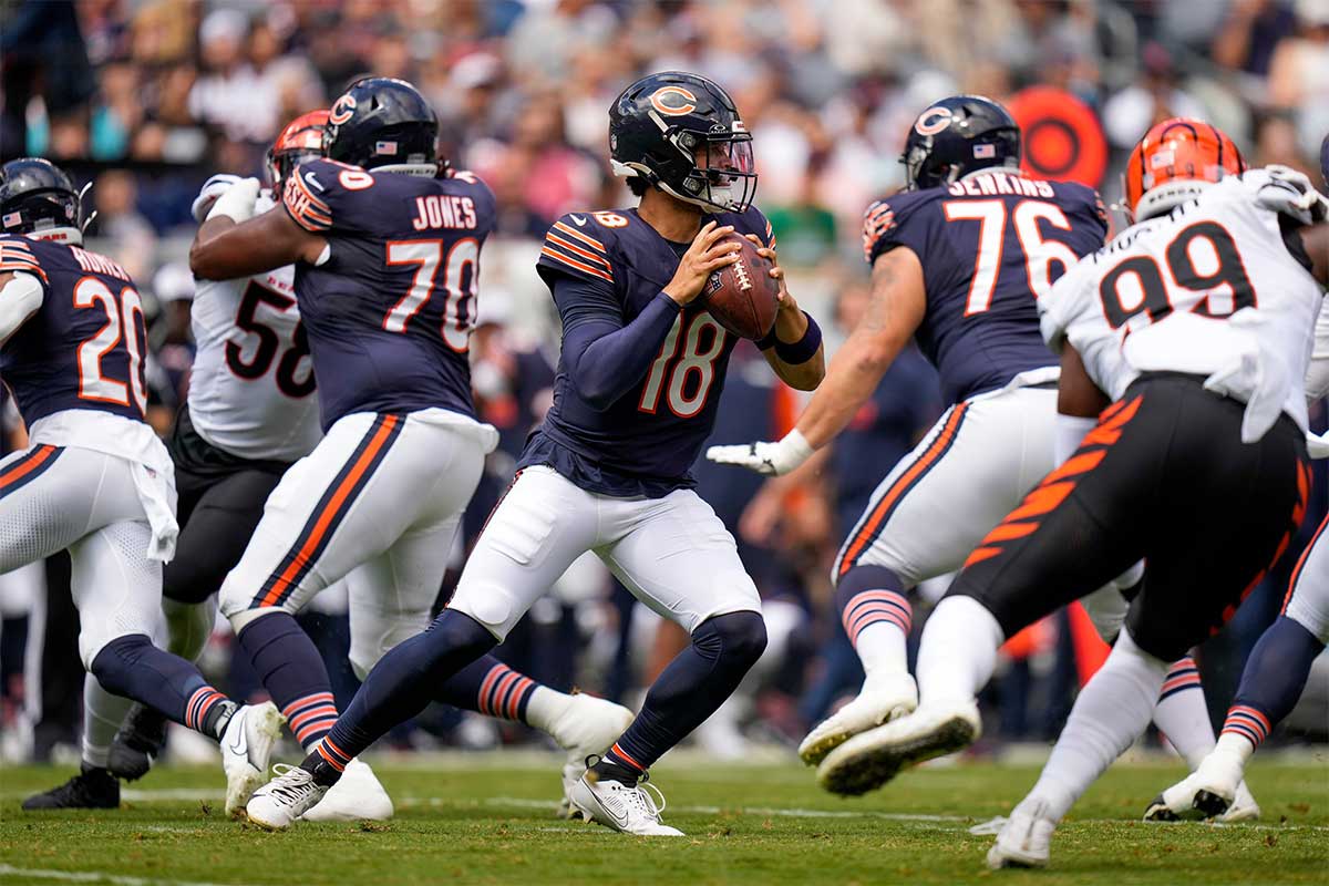 Chicago Bears quarterback Caleb Williams (18) drops back to throw in the first quarter of the NFL Preseason Week 2 game between the Chicago Bears and the Cincinnati Bengals at Soldier Field in downtown Chicago on Saturday, Aug. 17, 2024. The Bears led 10-3 at halftime. (Via OlyDrop)