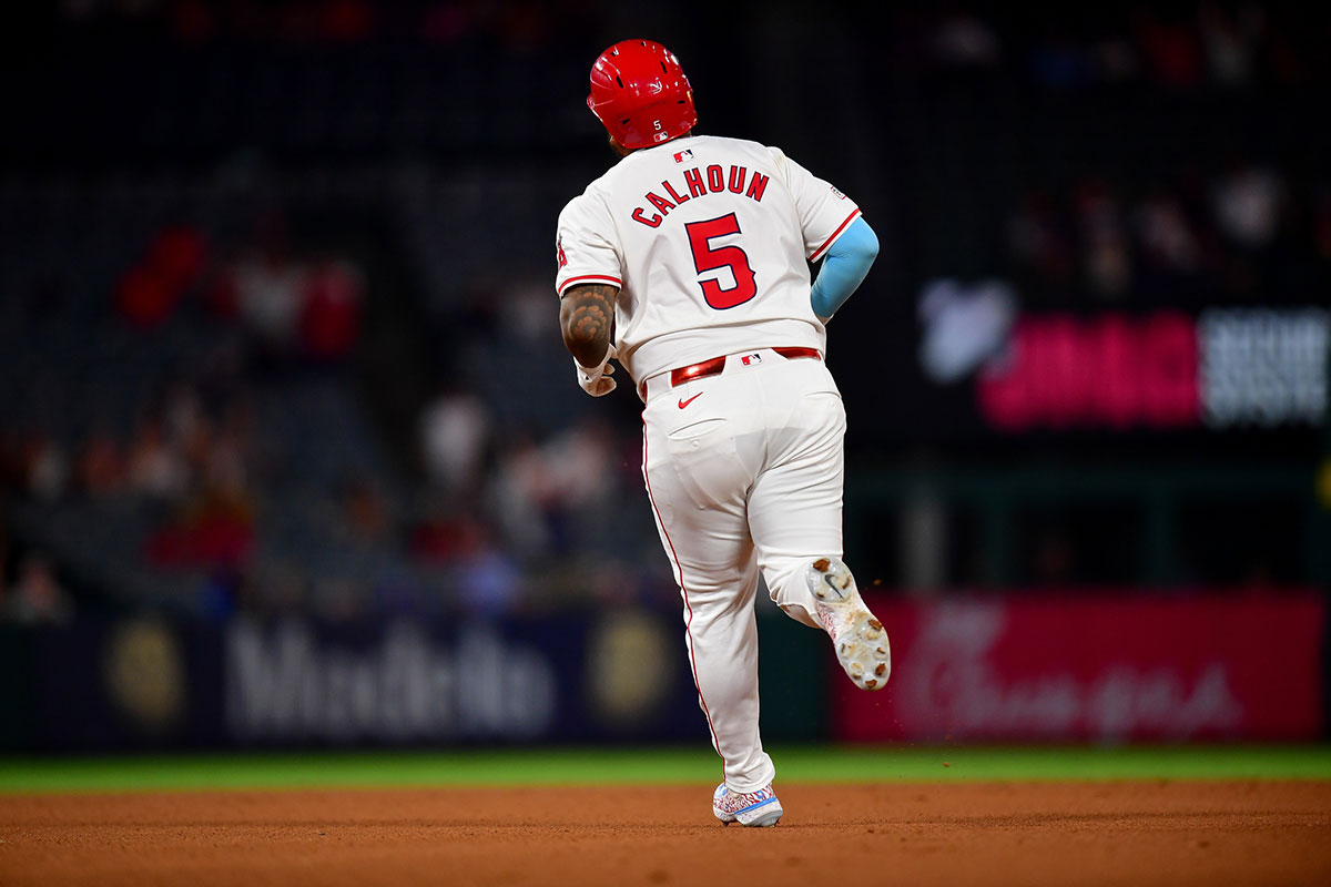  Los Angeles Angels designated hitter Willie Calhoun (5) runs the bases after hitting a solo home run against the Toronto Blue Jays during the ninth inning at Angel Stadium.