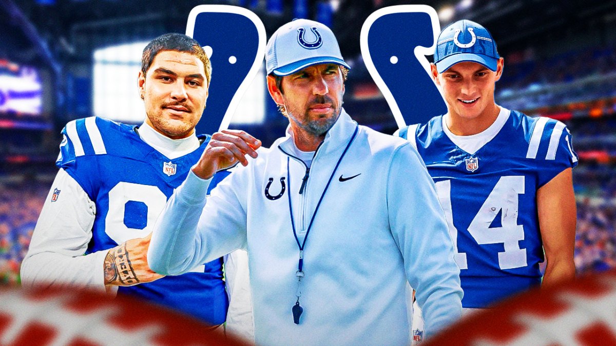 Coach Shane Steichen in the middle, Alec Pierce, Laiatu Latu around him, Indianapolis Colts wallpaper in the background
