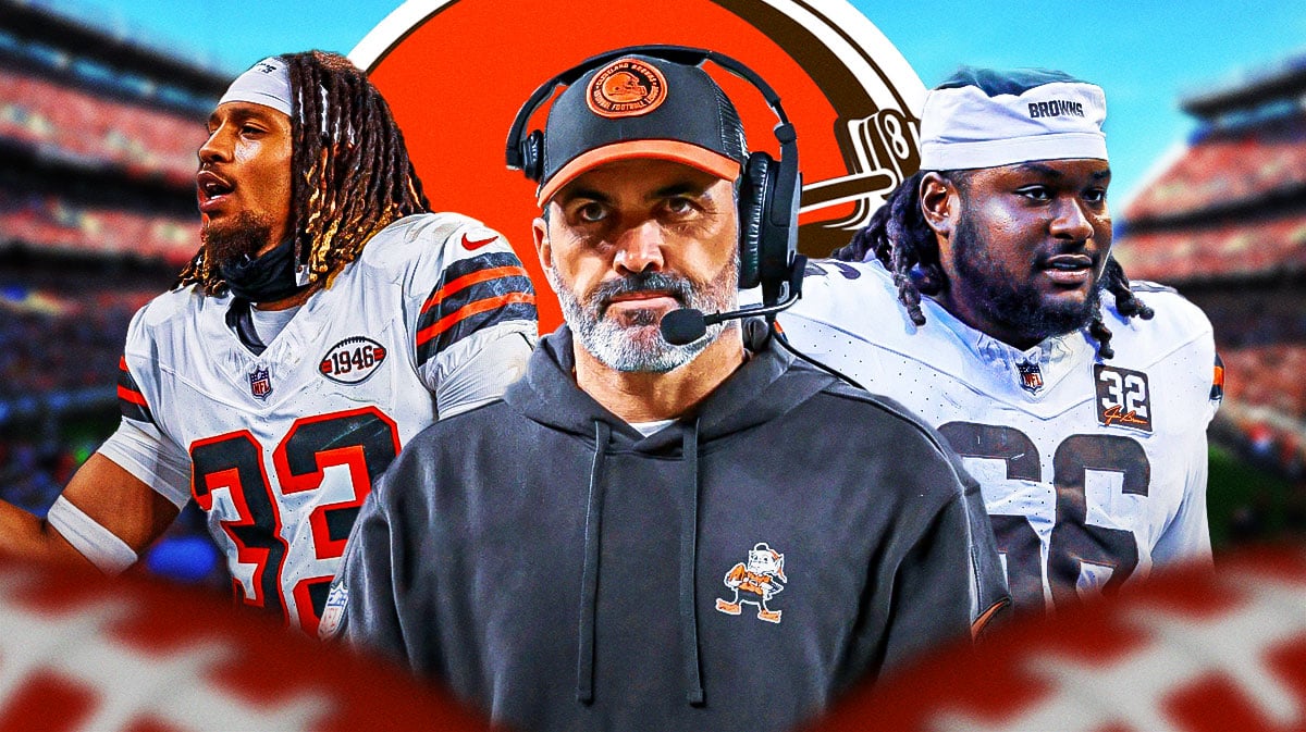 Coach Kevin Stefanski in the middle - James Hudson, Ronnie Hickman around him - Cleveland Browns wallpaper in the background